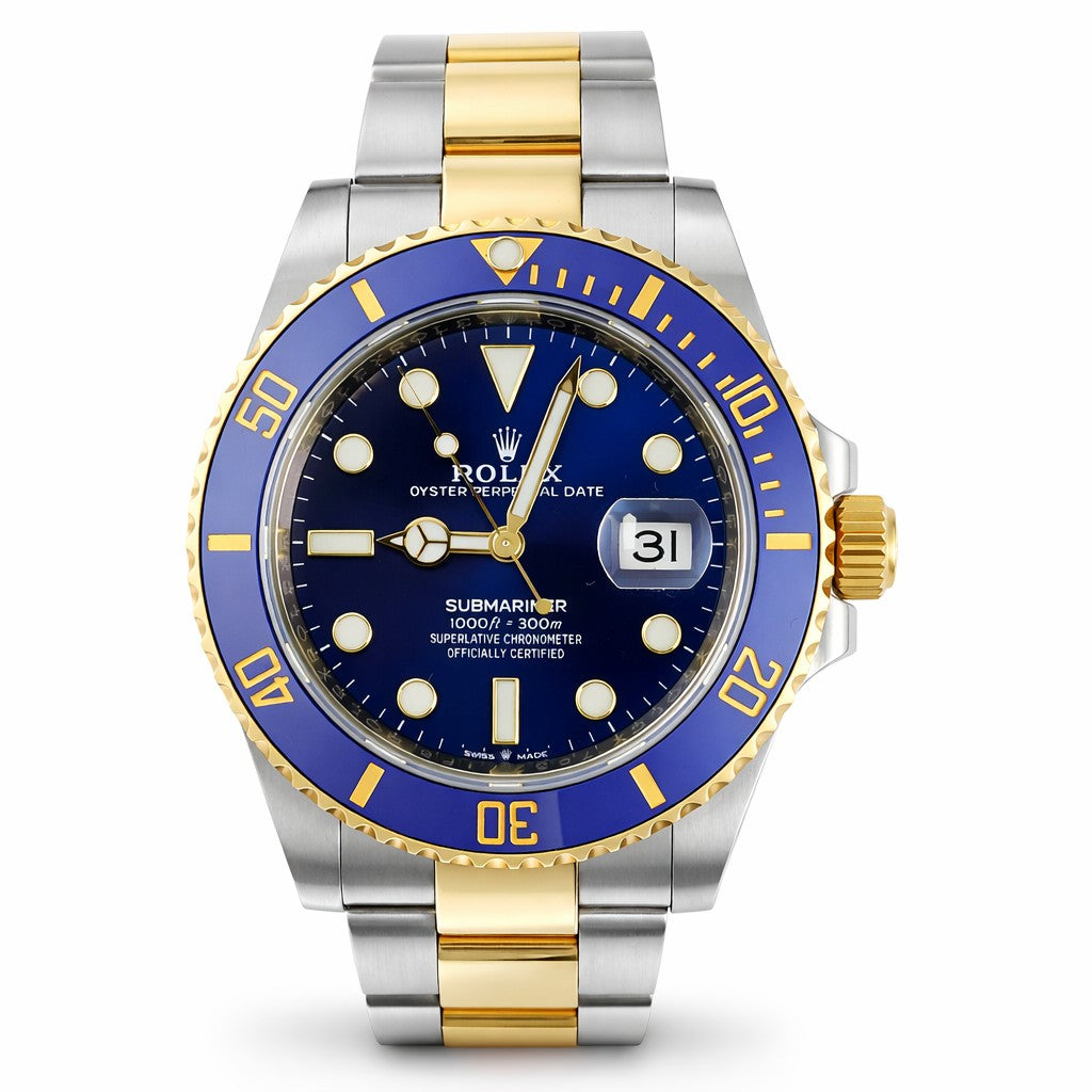 Rolex watch with blue face and gold and silver band on white background