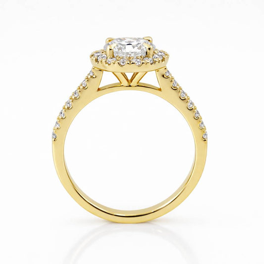 Gold ring with a diamond on a white background