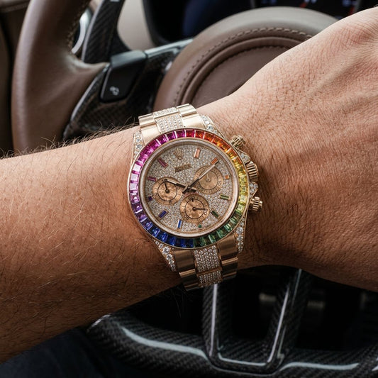 A close-up of a wrist wearing a luxury chronograph watch with a rose gold-toned case and link bracelet, set against a blurred car interior background.