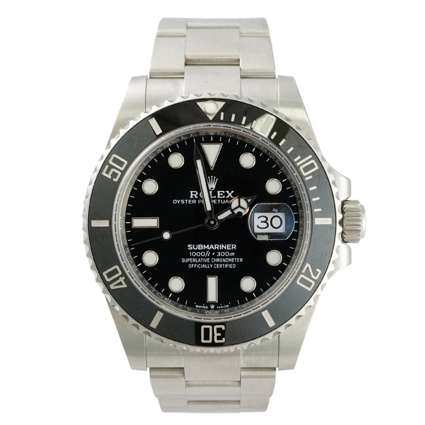 Rolex Submariner watch with black dial and silver metal bracelet on a white background