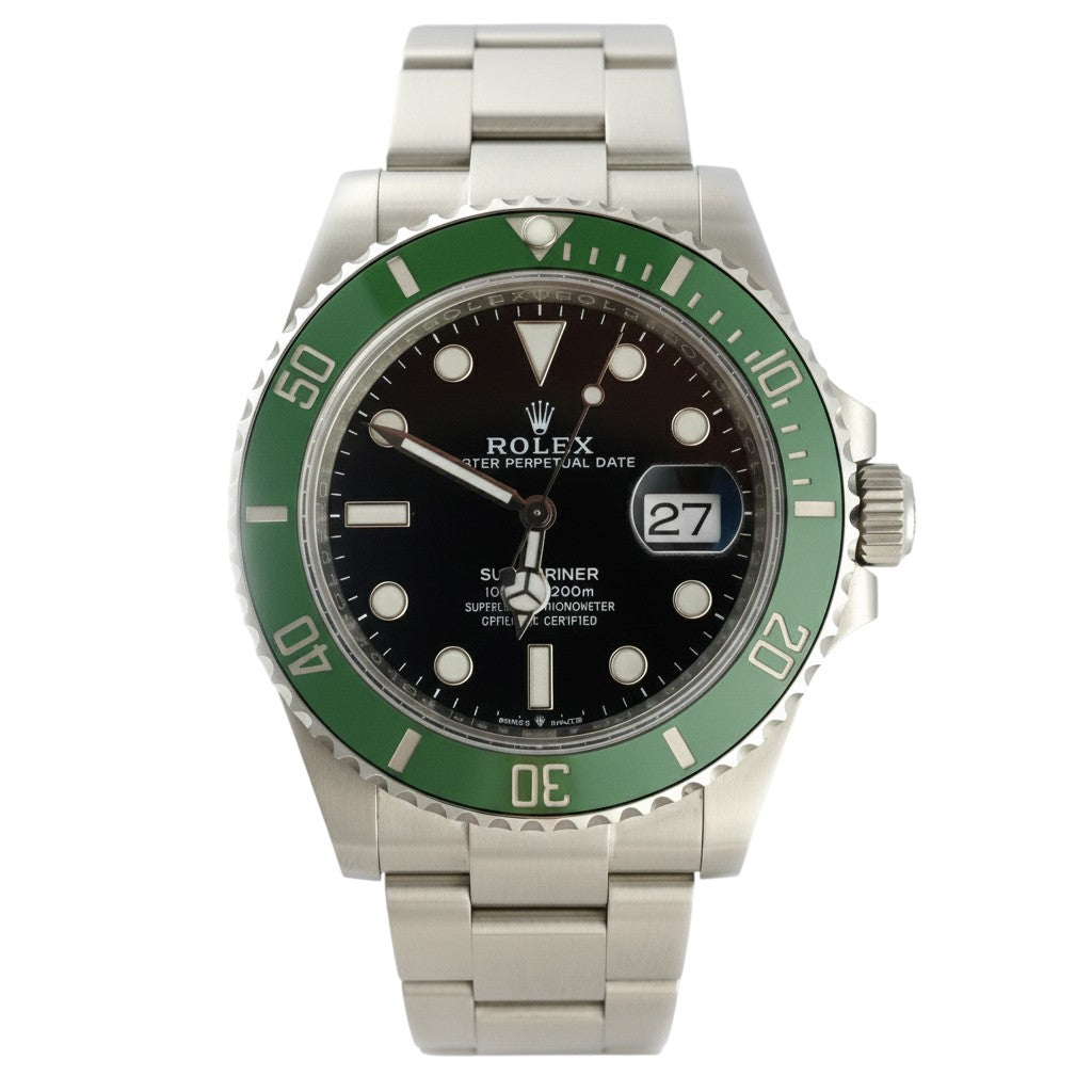 Rolex watch with green bezel and black face on a white background
