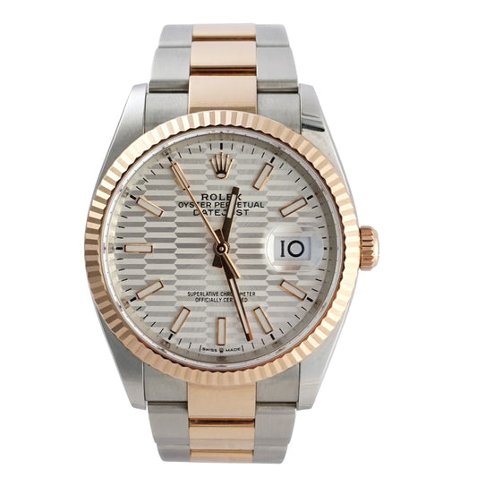 Two-tone watch with silver and rose gold band on a white background