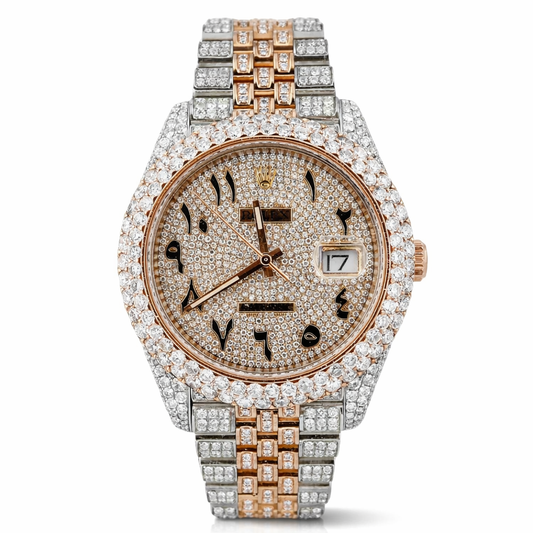 Luxury watch with rose gold and silver band, diamond-studded face on white background