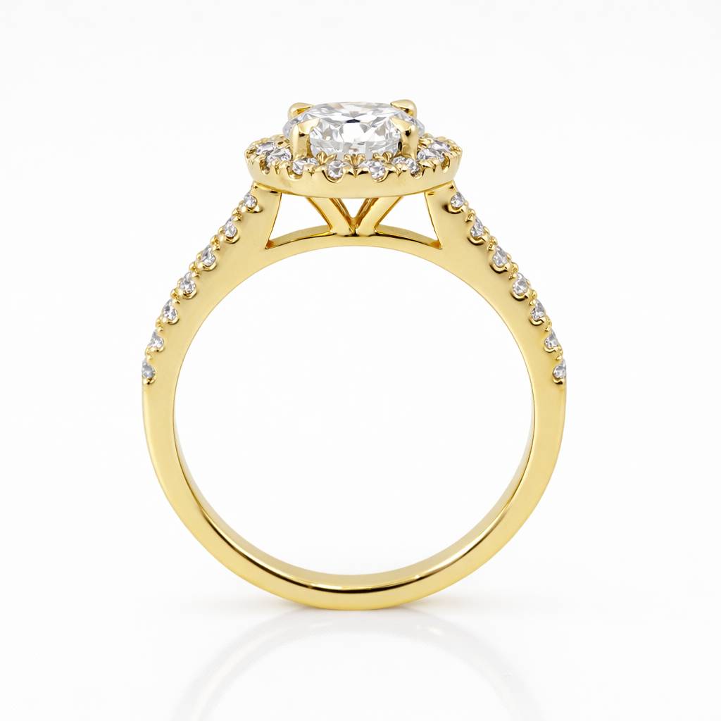 Gold ring with a diamond on a white background