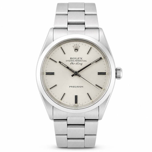 Rolex Oyster Perpetual Auto-King Precision watch with a stainless steel Oyster bracelet and a cream-colored dial.