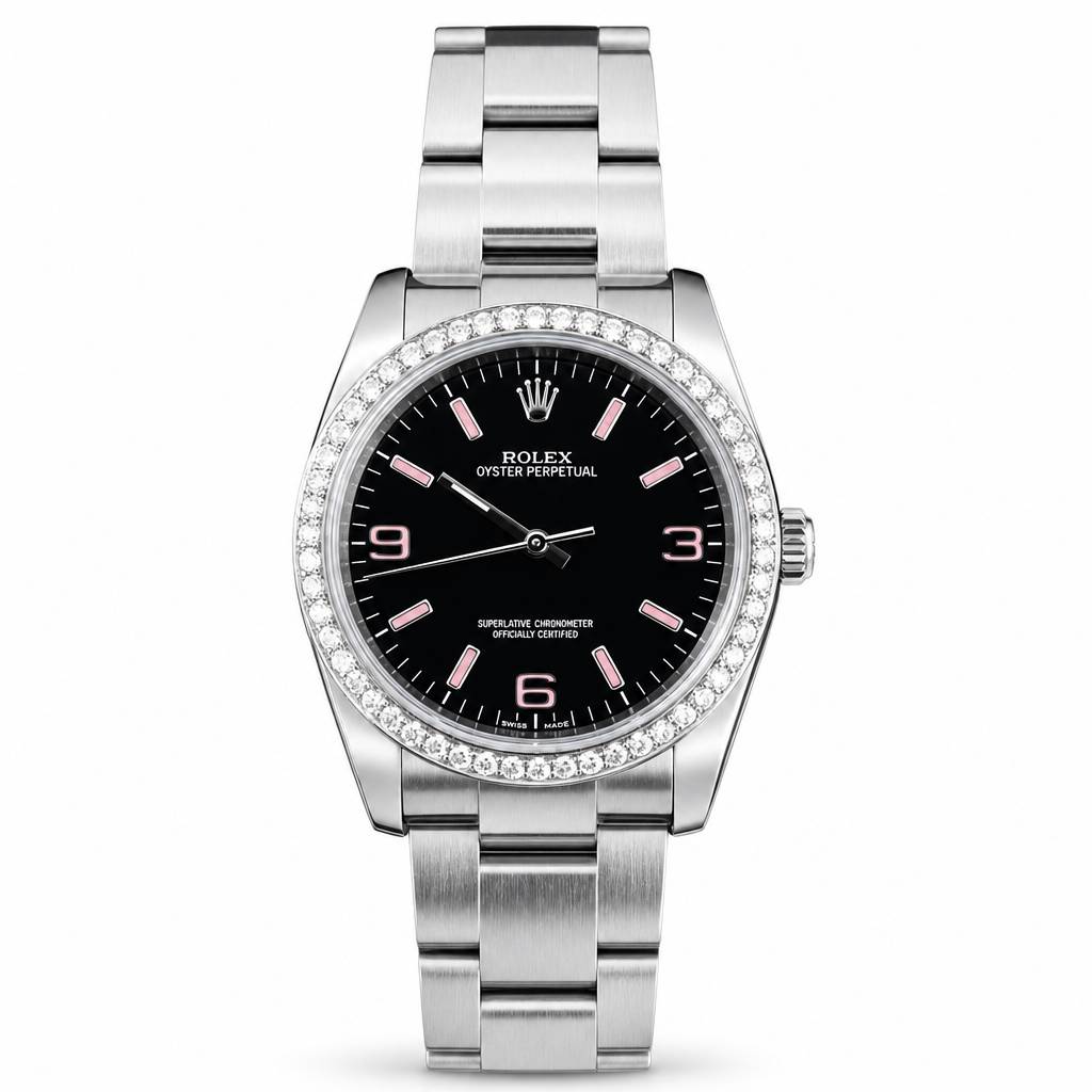 Rolex Oyster Perpetual watch with a black dial, pink indices, and a diamond-encrusted bezel, paired with a silver stainless steel Oyster bracelet.