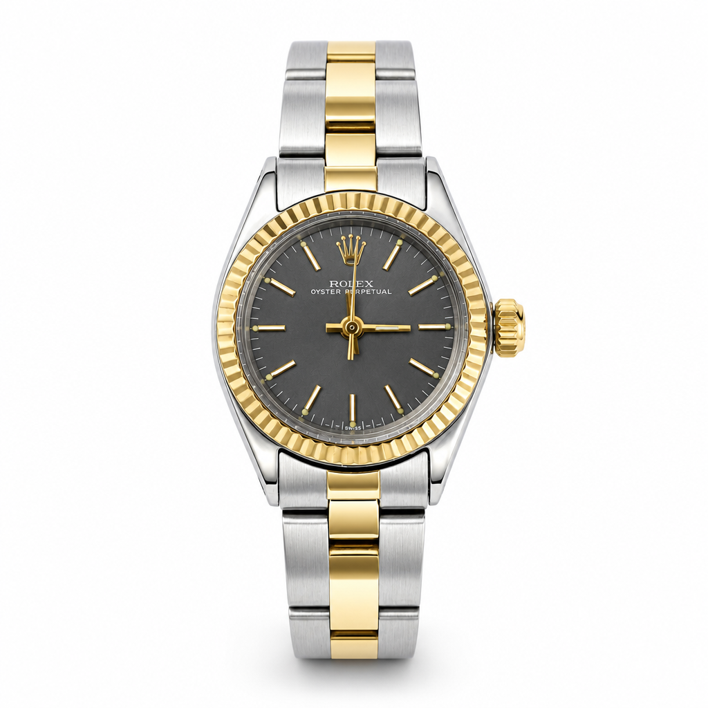 Two-tone silver and gold watch with a black dial on a white background