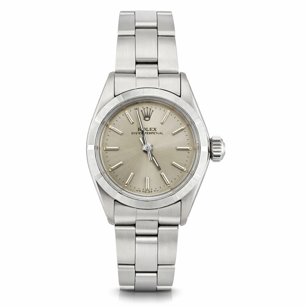 Silver watch with a beige dial on a white background